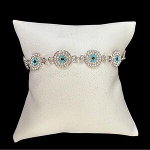 Paved evil eyes bracelet silver plated